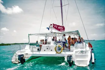 Catamaran Cruise to Ile aux Cerfs – Snorkeling, GRSE Waterfall, BBQ Lunch